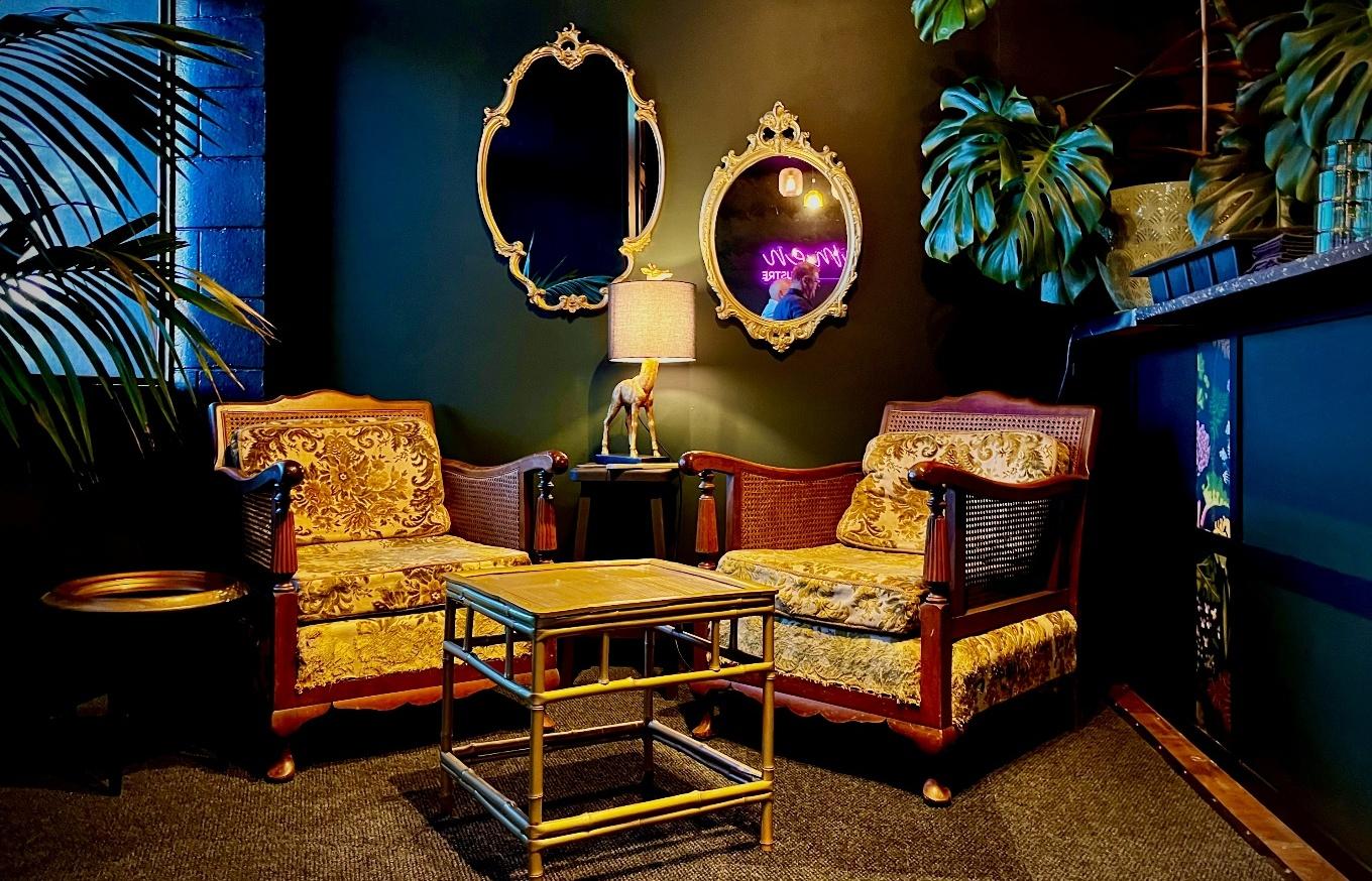 Vintage armchairs and gilt mirrors in Lumen by Lustre